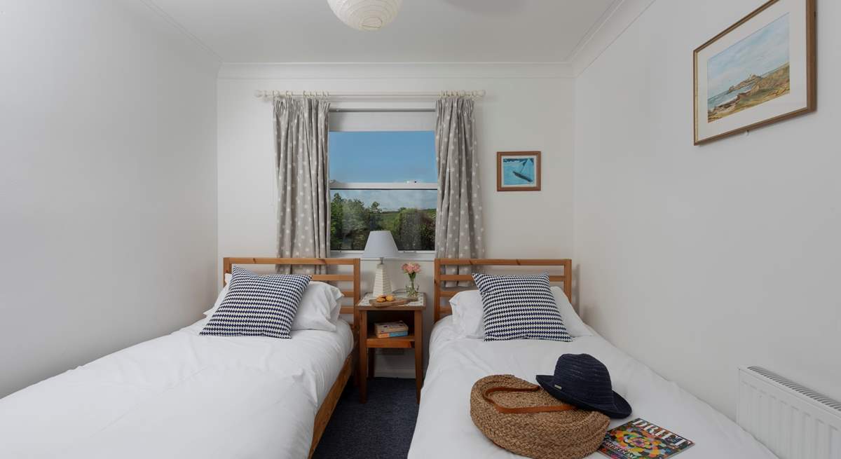 A sweet twin room upstairs.
