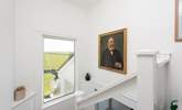 The view from the staircase shows the front garden. - Thumbnail Image