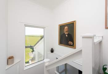 The view from the staircase shows the front garden.