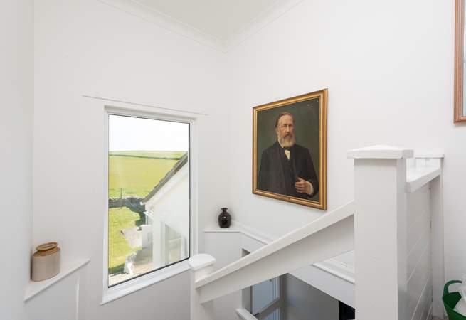 The view from the staircase shows the front garden.