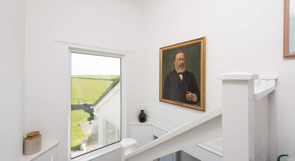 The view from the staircase shows the front garden.