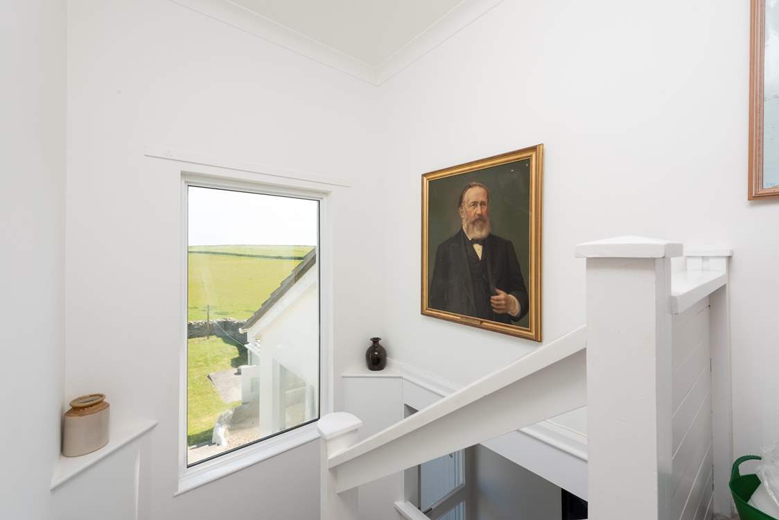 The view from the staircase shows the front garden.
