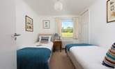 A sweet twin room on the ground floor with garden views. - Thumbnail Image