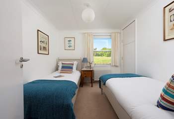 A sweet twin room on the ground floor with garden views.