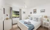 A king-size bedroom on the ground floor overlooking the gorgeous garden. - Thumbnail Image