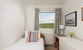 The third bedroom on the ground floor is a simple single overlooking the fields beyond. - Thumbnail Image