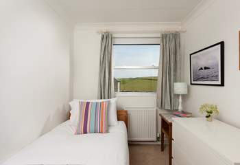 The third bedroom on the ground floor is a simple single overlooking the fields beyond.
