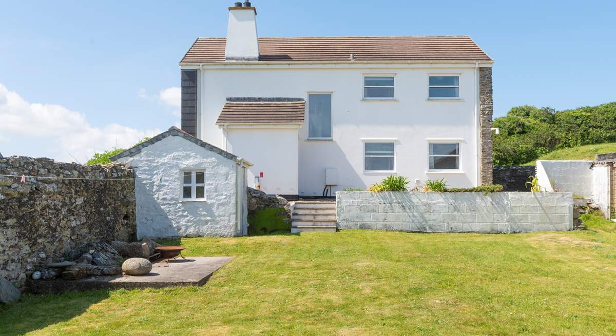 You can enjoy walled gardens, at the front and back of the home.