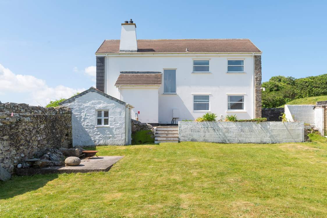 You can enjoy walled gardens, at the front and back of the home.