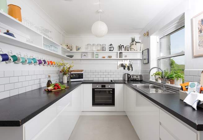 Spacious, light, and very well-equipped, the kitchen is a pleasure for any aspiring chef.