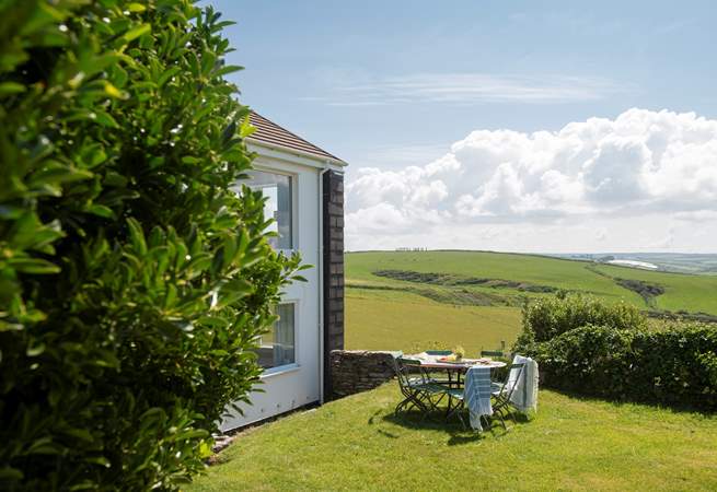 360 degrees of rolling countryside embrace this very special property. Take care, there is a drop from the garden (approx 2ft) before the house, please use the steps.