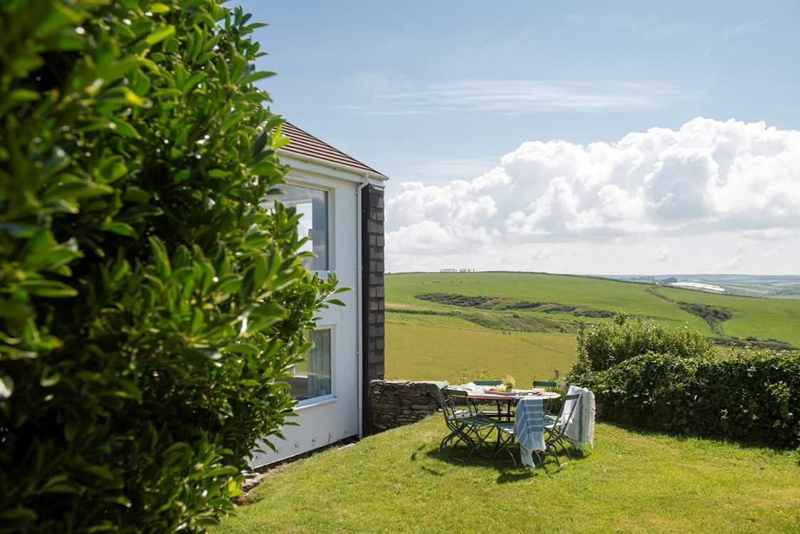 360 degrees of rolling countryside embrace this very special property.