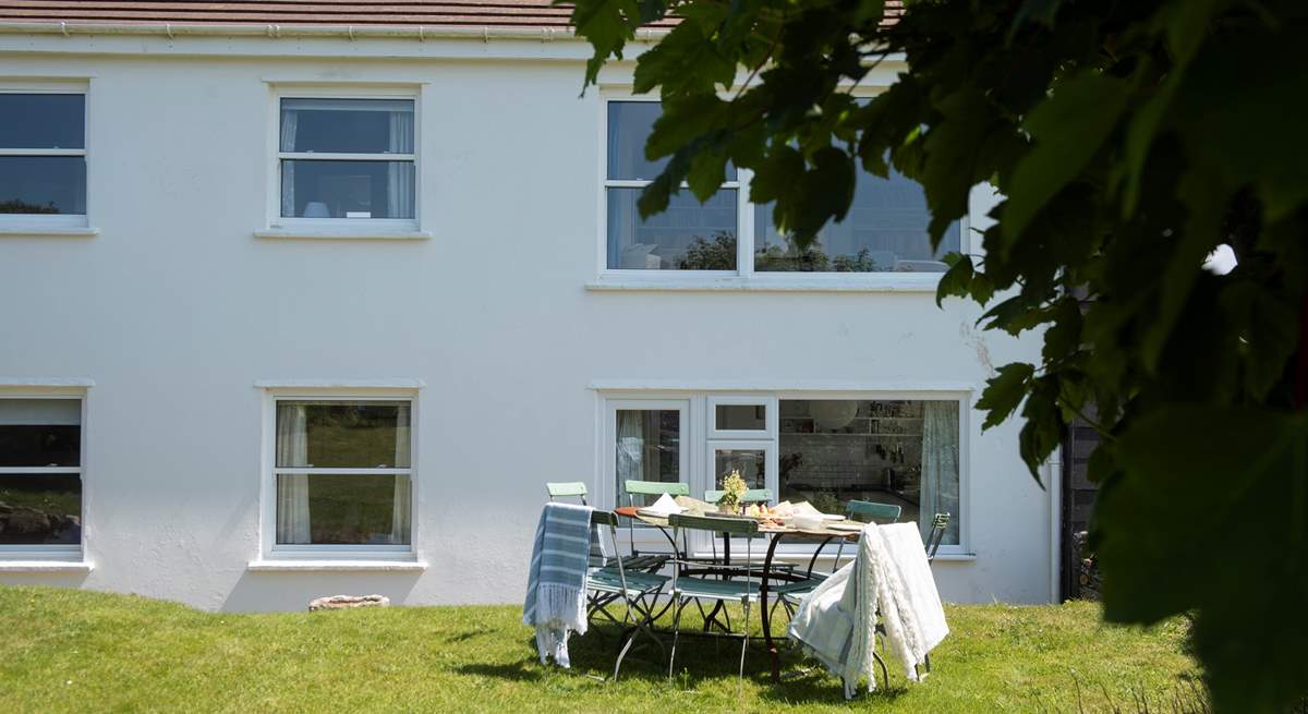 Light the barbecue and enjoy dining outside in this secluded location.