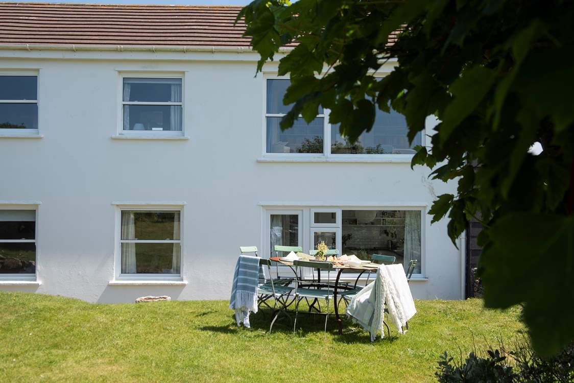 Light the barbecue and enjoy dining outside in this secluded location.
