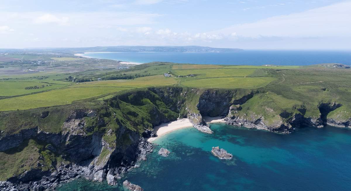 A stunning aerial view of the coastline surrounding this secluded property.