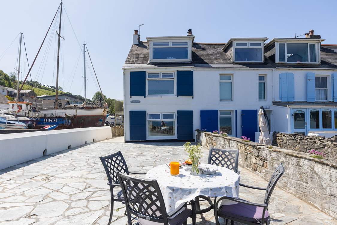 Enjoy breakfast overlooking the water in the Cornish sunshine.
