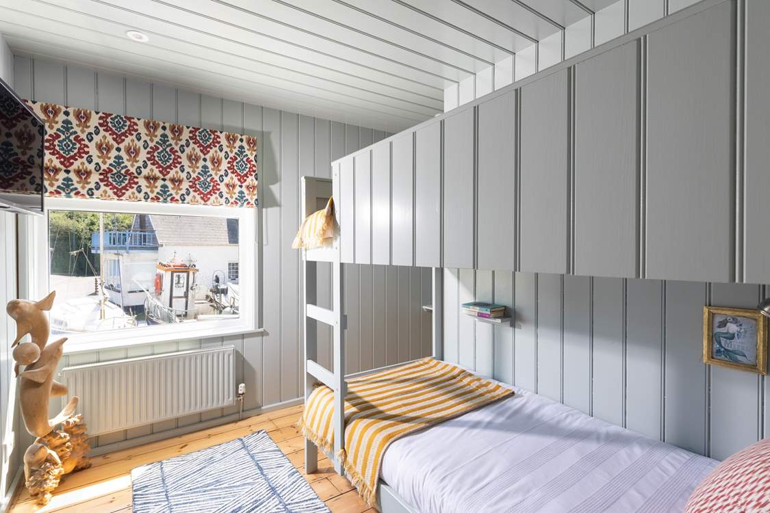Children will love this cool bunk-bed room.