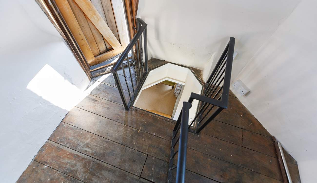 Climb the ladder to the rooftop garden.