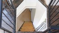The stairs to the rooftop terrace, from above. Please take care when proceeding up and down the stair ladder to the balcony