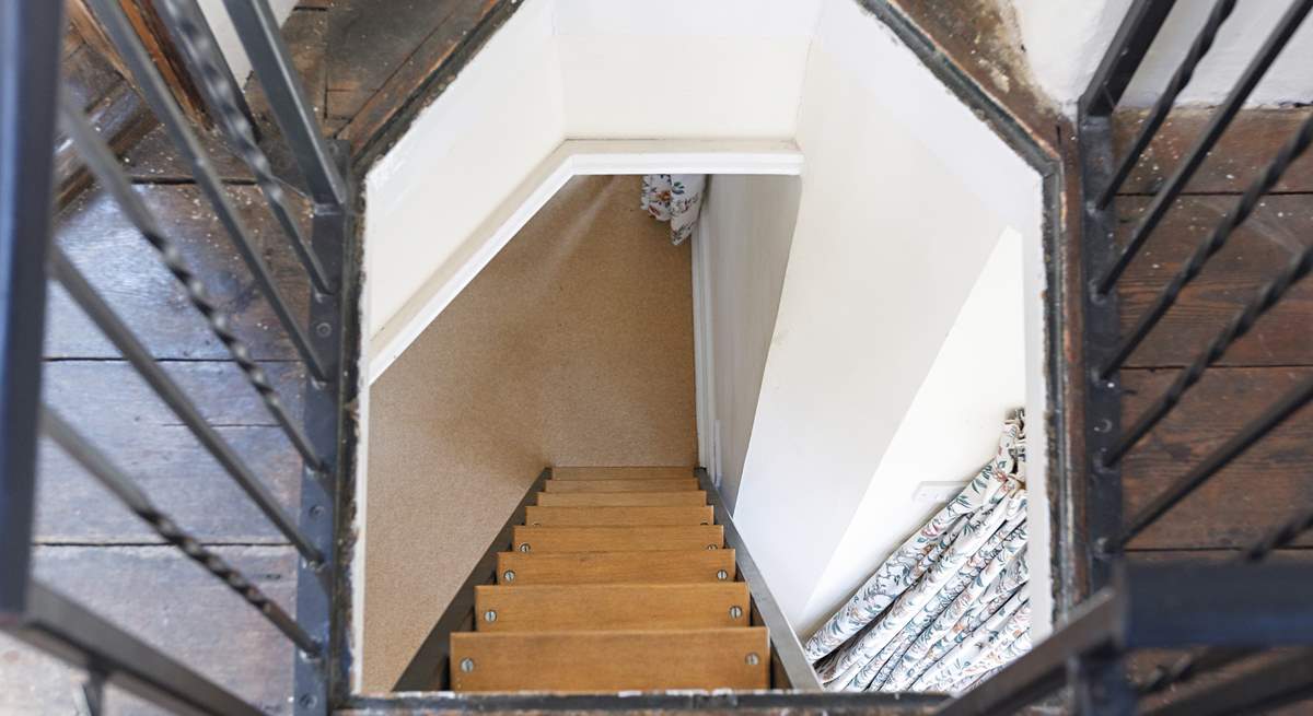 The stairs to the rooftop terrace, from above.