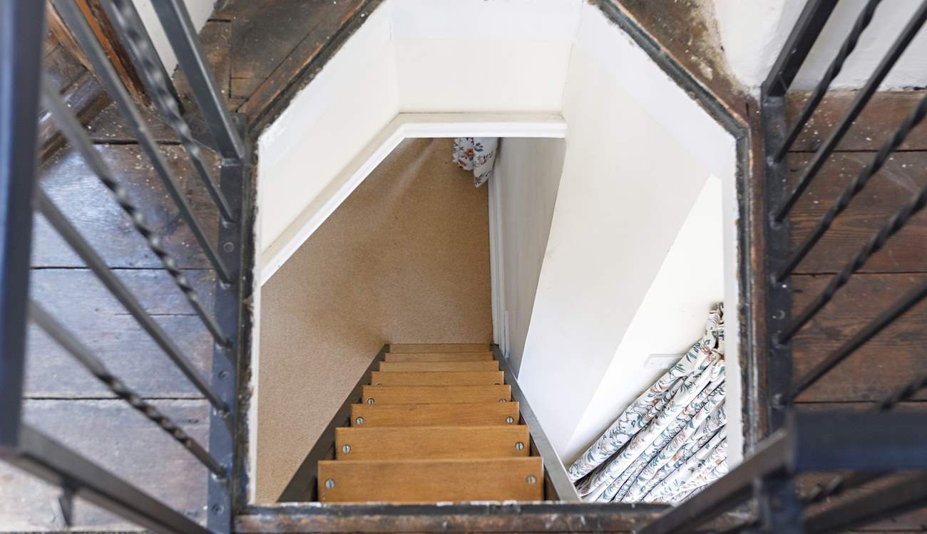 The stairs to the rooftop terrace, from above. Please take care when proceeding up and down the stair ladder to the balcony