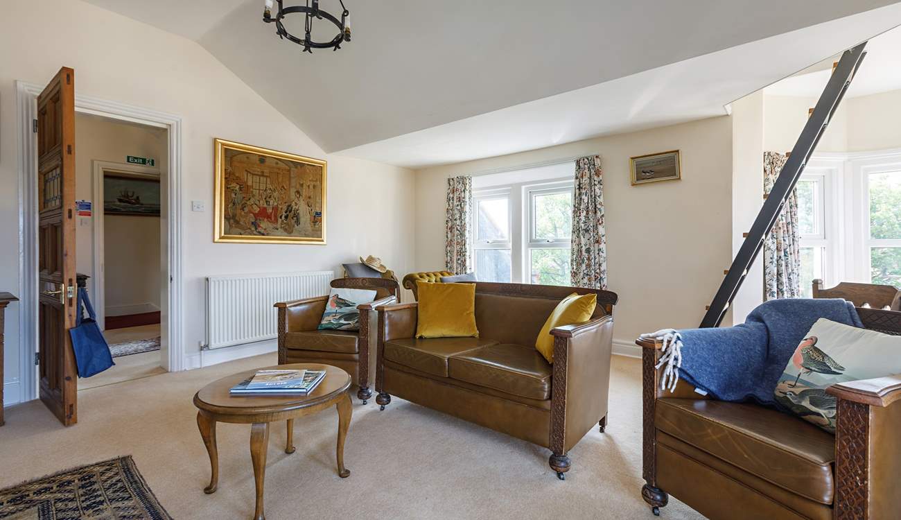 The light floods in through the many windows with great views.