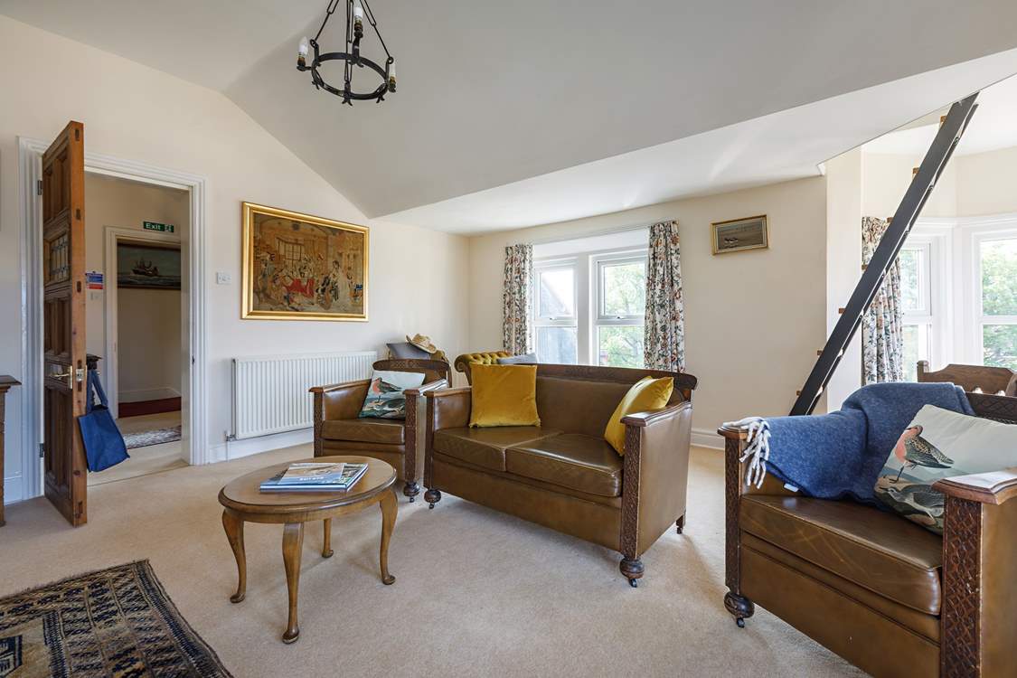 The light floods in through the many windows with great views.