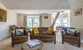 The spacious sitting-room where the sunshine floods in from the triple-aspect windows. - Thumbnail Image