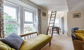 Relax on the chaise with your favourite novel. - Thumbnail Image