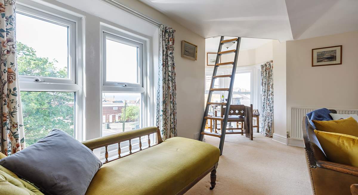Relax on the chaise with your favourite novel.
