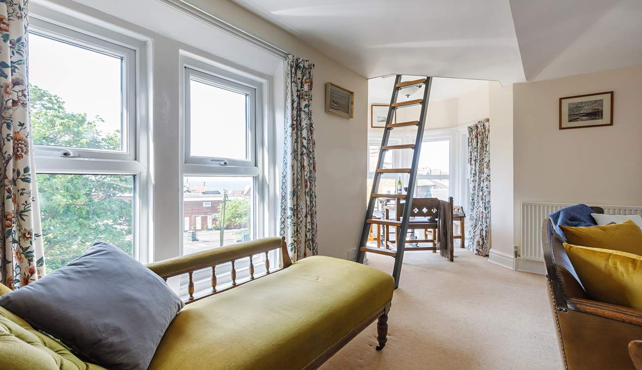 Relax on the chaise with your favourite novel.