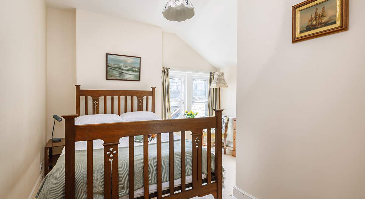 The double bedroom with antique bedstead.