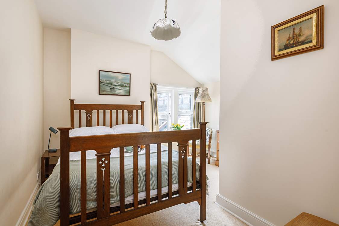 The double bedroom with antique bedstead.