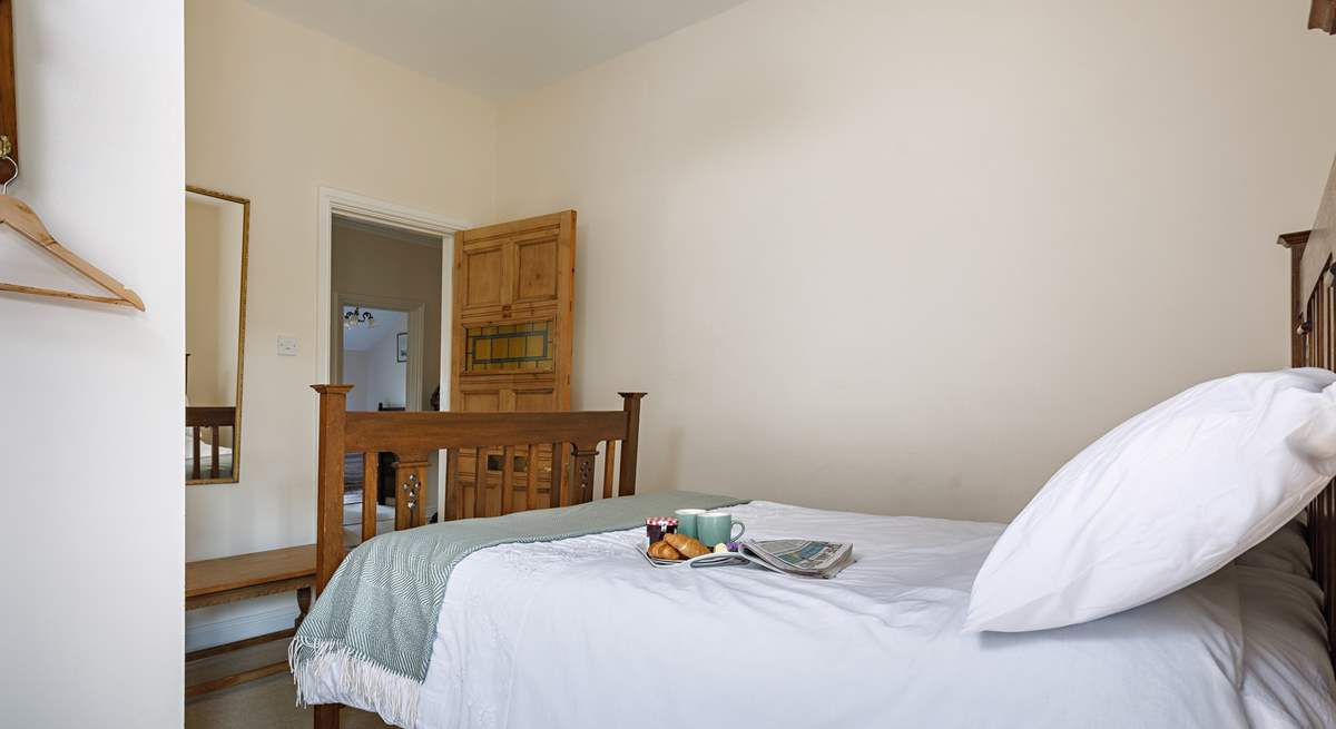 Enjoy breakfast in bed in the main bedroom.