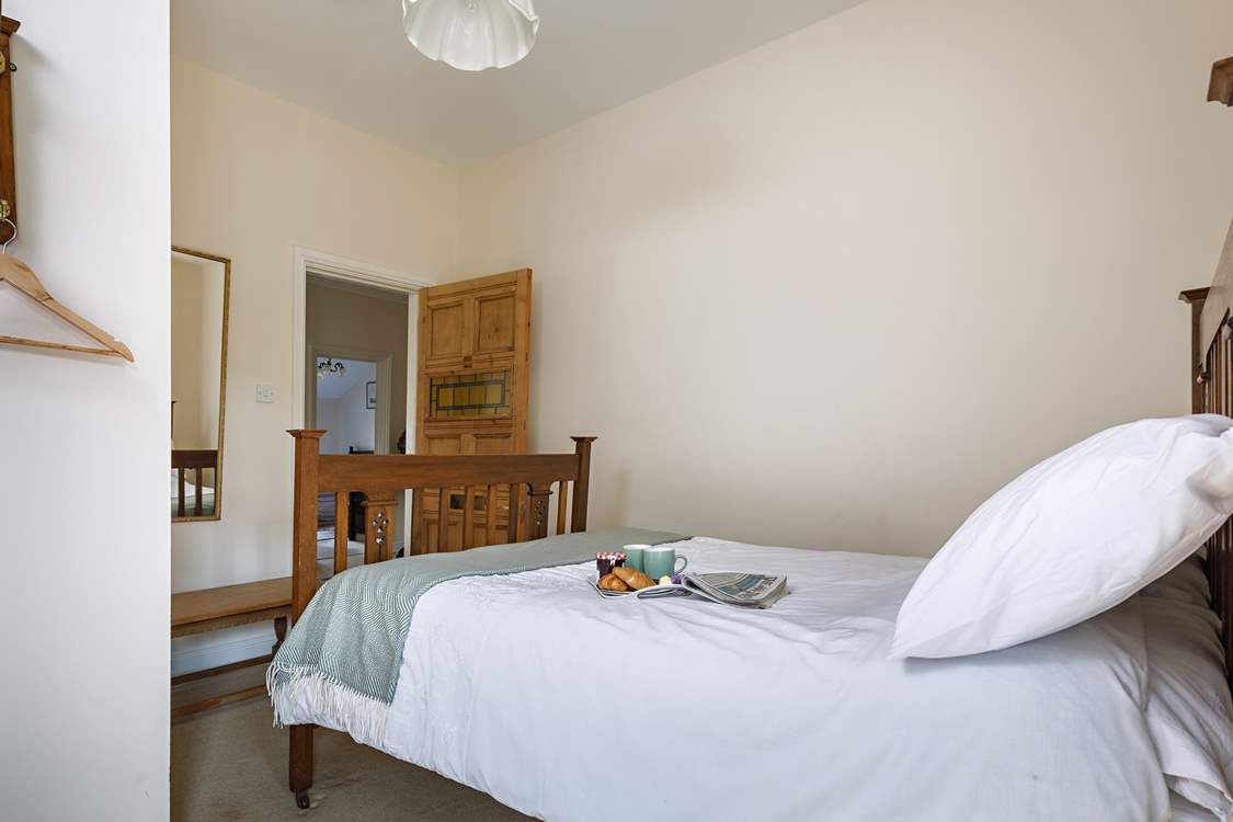 Enjoy breakfast in bed in the main bedroom.