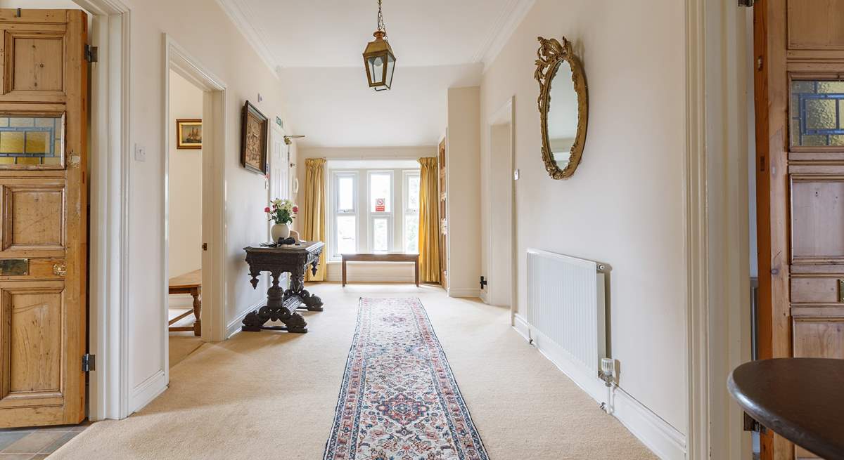 After climbing the stairs you are greeted by this spacious entrance hall.