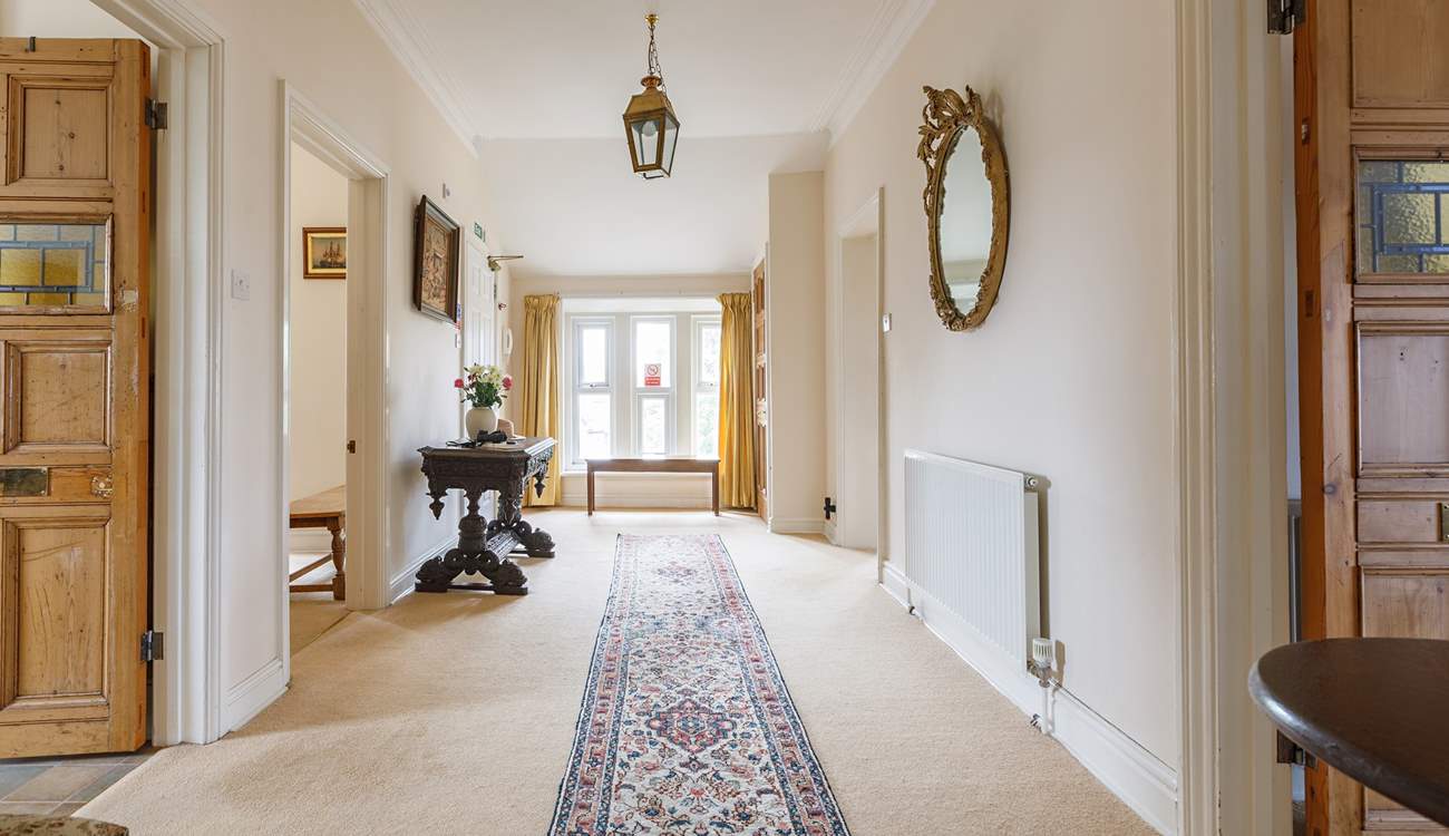 After climbing the stairs you are greeted by this spacious entrance hall.