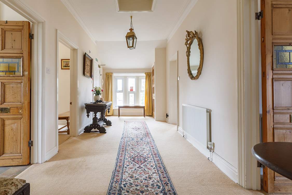 After climbing the stairs you are greeted by this spacious entrance hall.