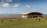 Just two minutes' walk from the apartment is the Green, sea front and bowling alley beyond the Green. - Thumbnail Image