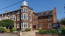 Welcome to the beautiful 'Arts & Crafts' Vicarage Apartment; enjoy stunning views from the rooftop garden..