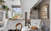 What a compact yet cute place to whip up the perfect meal for two. - Thumbnail Image