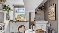 What a compact yet cute place to whip up the perfect meal for two.