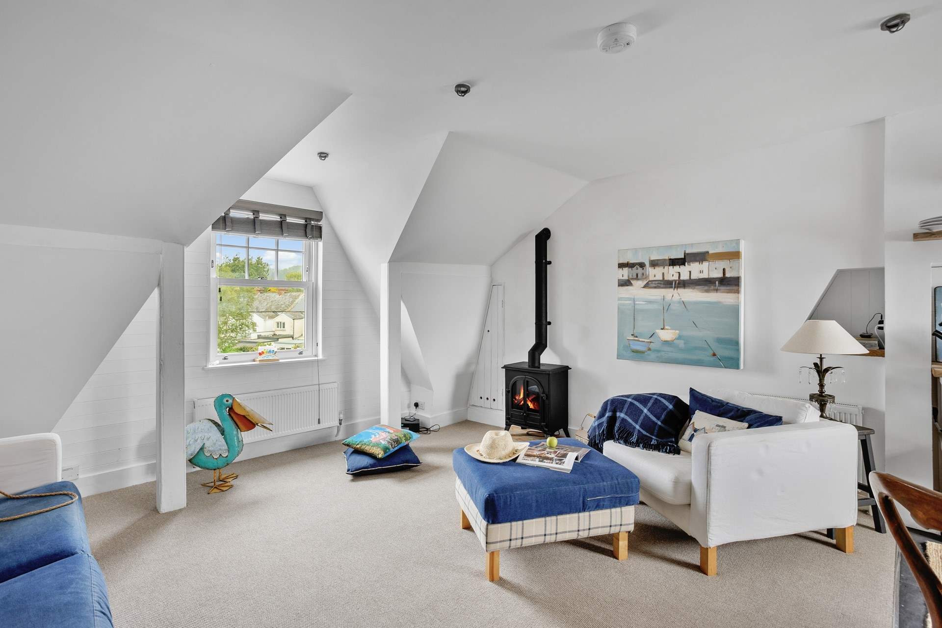 The living-room boasts a wood-burner effect electric stove, perfect for those relaxing nights in.