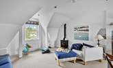 The living-room boasts a wood-burner effect electric stove, perfect for those relaxing nights in. - Thumbnail Image