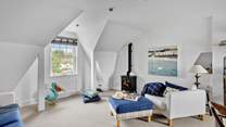 The living-room boasts a wood-burner effect electric stove, perfect for those relaxing nights in.
