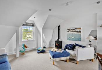 The living-room boasts a wood-burner effect electric stove, perfect for those relaxing nights in.