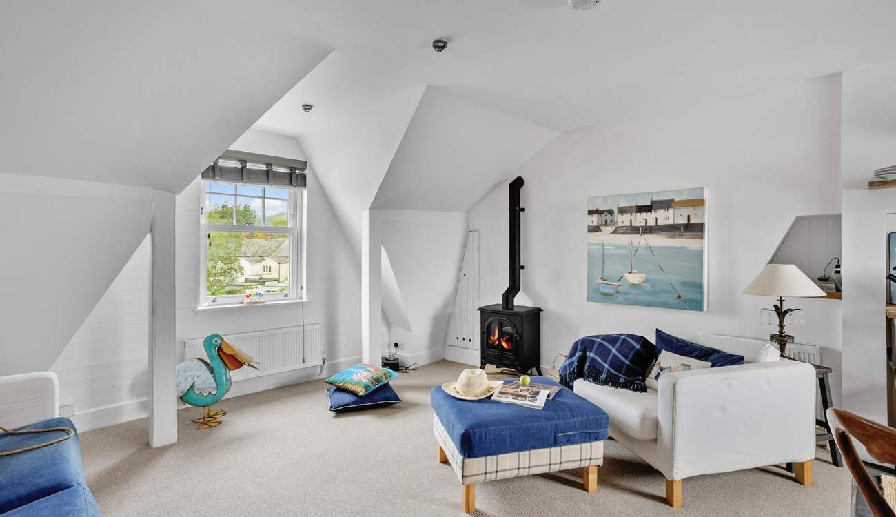 The living-room boasts a wood-burner effect electric stove, perfect for those relaxing nights in.