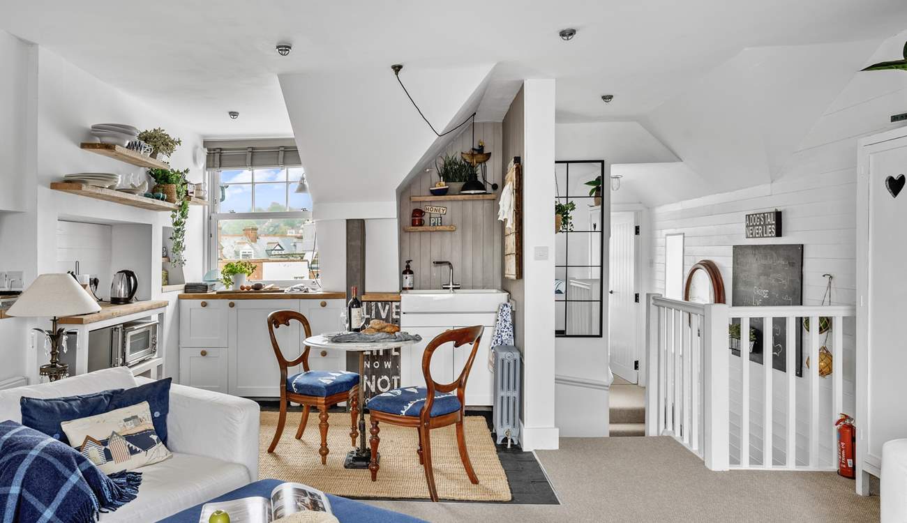 Looking down the hallway towards the bedroom and bathroom. Please take care on the steps which drop down and then lead back up.
