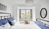 Retiring at night to this inviting king-size bed is always a treat. - Thumbnail Image