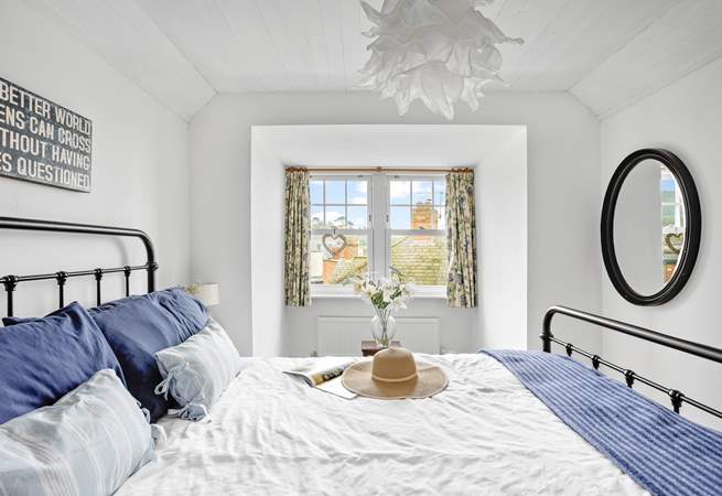 Retiring at night to this inviting king-size bed is always a treat.